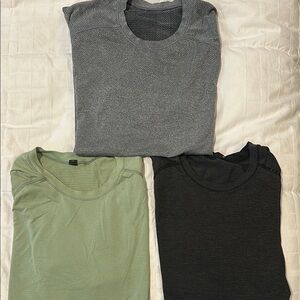 Set of Three Gray, Green, and Black Lululemon short sleeve workout top size Smal